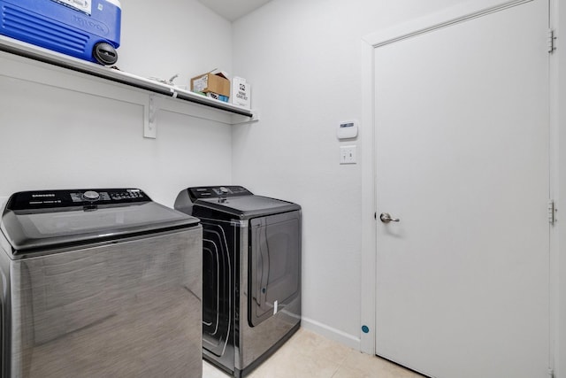 1536 Wolfberry Ln, Northlake, TX 76226 - washroom with independent washer and dryer, light tile patterned flooring, and baseboards