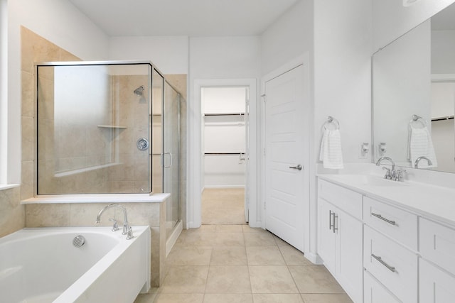1536 Wolfberry Ln, Northlake, TX 76226 - bathroom with a stall shower, a spacious closet, a garden tub, and vanity