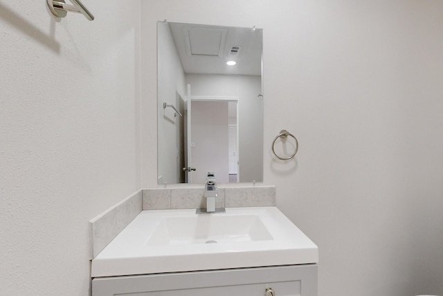 bathroom with visible vents and vanity