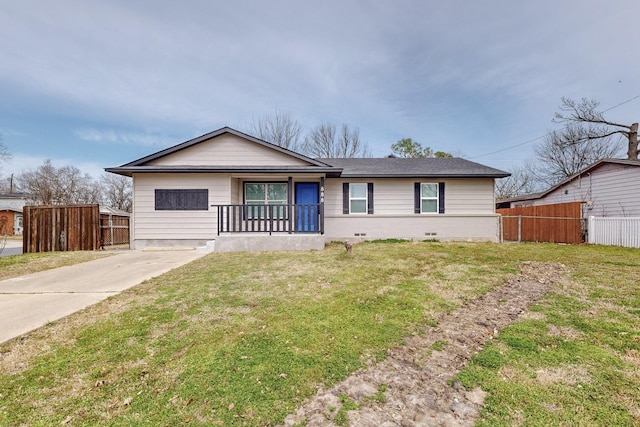 ranch-style house with a front yard, crawl space, and fence