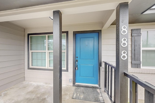 property entrance with a porch