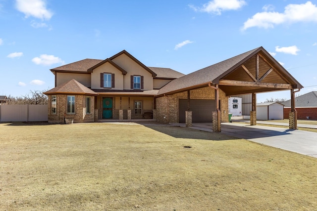 view of front of home featuring an attached garage, brick siding, fence, concrete driveway, and stucco siding