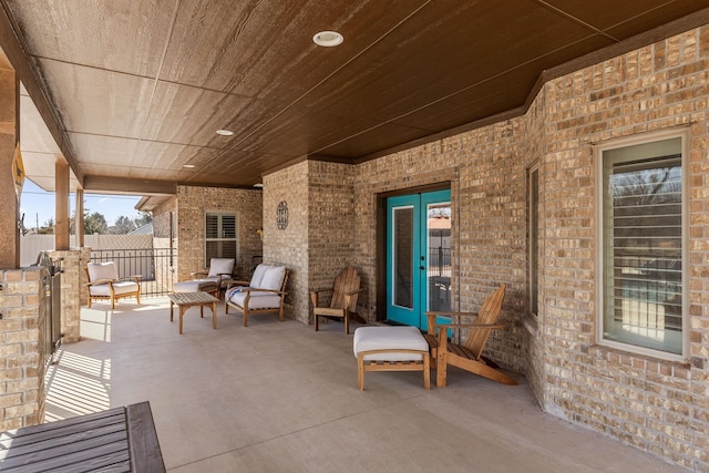 view of patio / terrace featuring fence