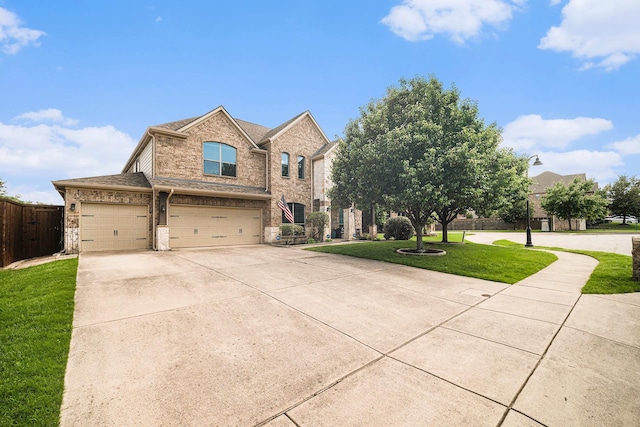 1202 Newcastle St, Roanoke, TX 76262 - view of front of house featuring a garage, concrete driveway, brick siding, and stone siding
