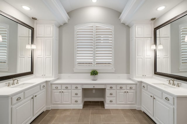 full bath featuring two vanities, a sink, and recessed lighting