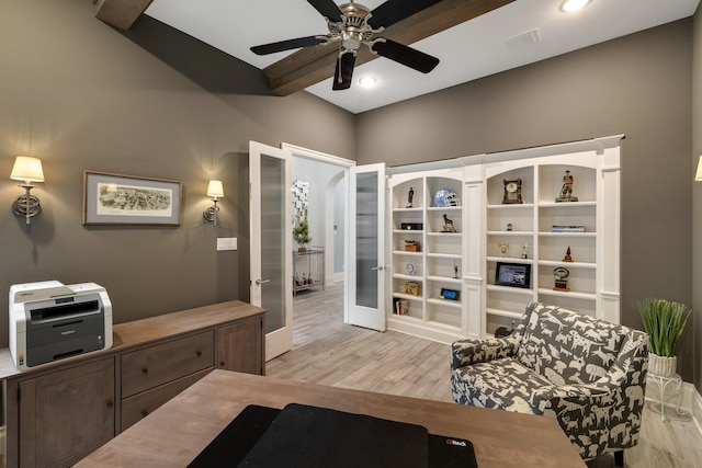 interior space with beam ceiling, french doors, light wood finished floors, visible vents, and ceiling fan