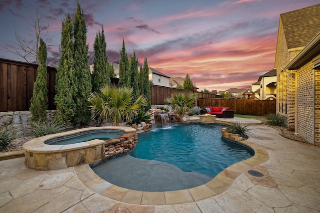 view of swimming pool featuring an outdoor hangout area, a patio area, a fenced backyard, and a pool with connected hot tub