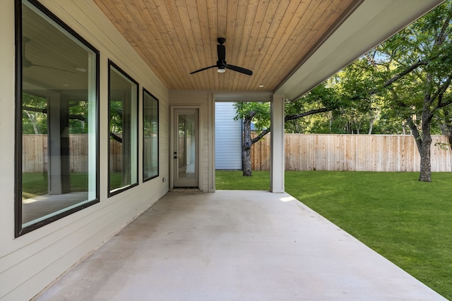 view of patio / terrace featuring ceiling fan and fence