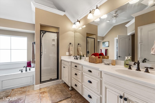 full bathroom with double vanity, a stall shower, lofted ceiling, crown molding, and a sink