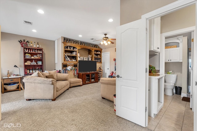 living room with ceiling fan, light tile patterned flooring, visible vents, and recessed lighting