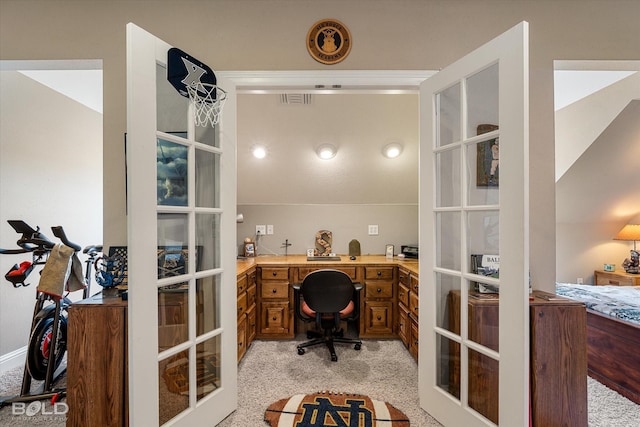 home office featuring visible vents, light colored carpet, and french doors