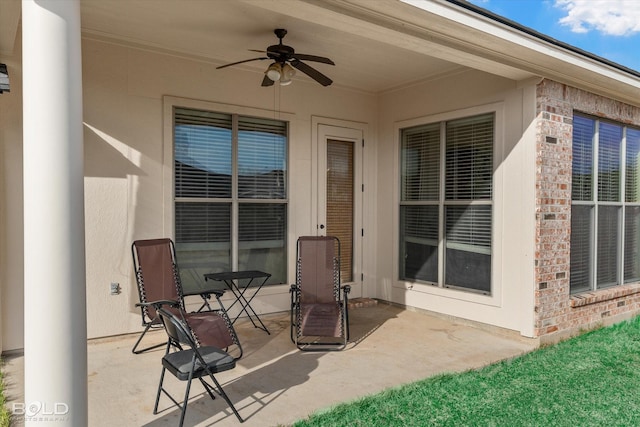 view of patio with a ceiling fan