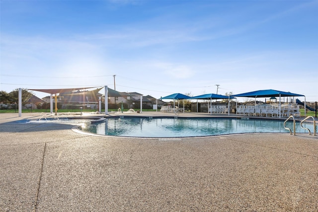 community pool with a patio