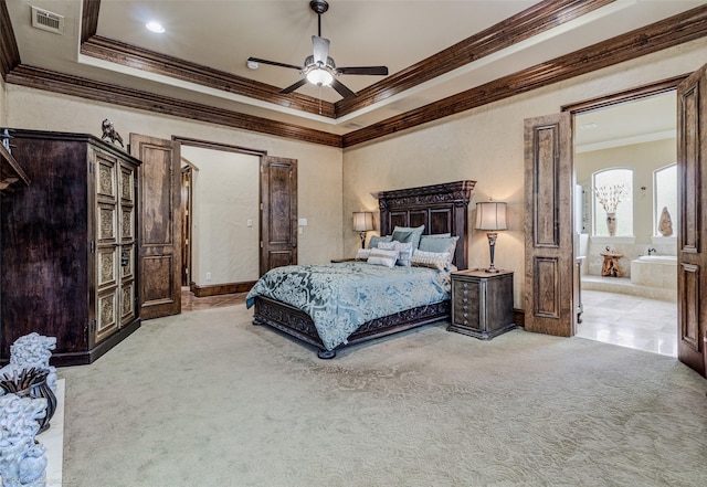 bedroom featuring carpet floors, visible vents, ornamental molding, and a ceiling fan