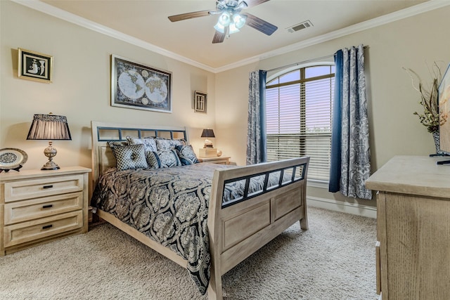 bedroom with a ceiling fan, baseboards, visible vents, and crown molding