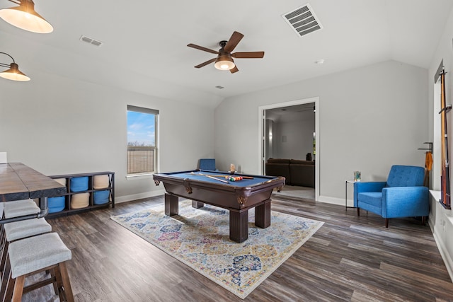 recreation room featuring vaulted ceiling, dark wood-type flooring, and visible vents