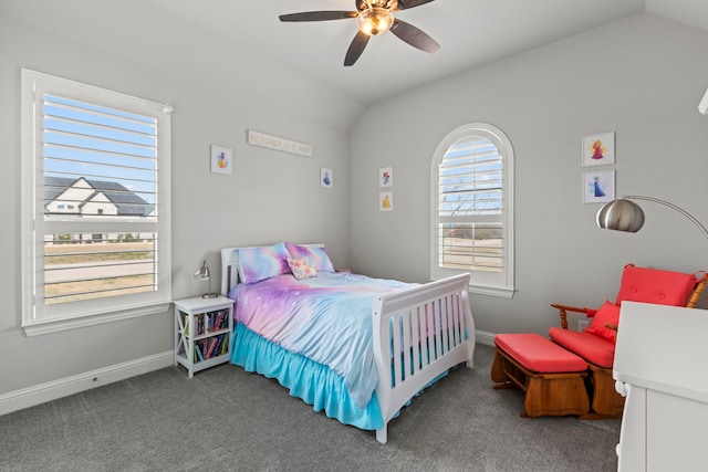 bedroom with lofted ceiling, a ceiling fan, baseboards, and carpet flooring