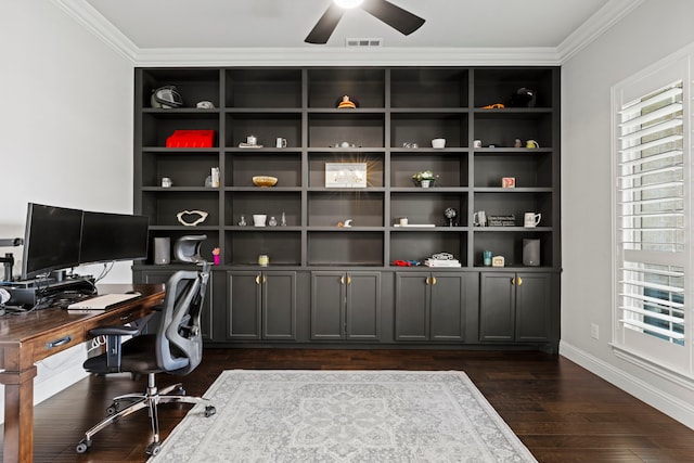 office space featuring ornamental molding, a healthy amount of sunlight, visible vents, and dark wood-style floors