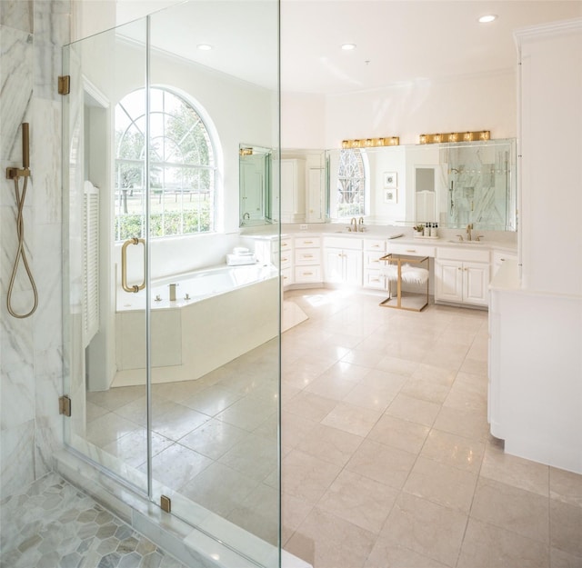 full bathroom featuring vanity, recessed lighting, a stall shower, a garden tub, and tile patterned floors