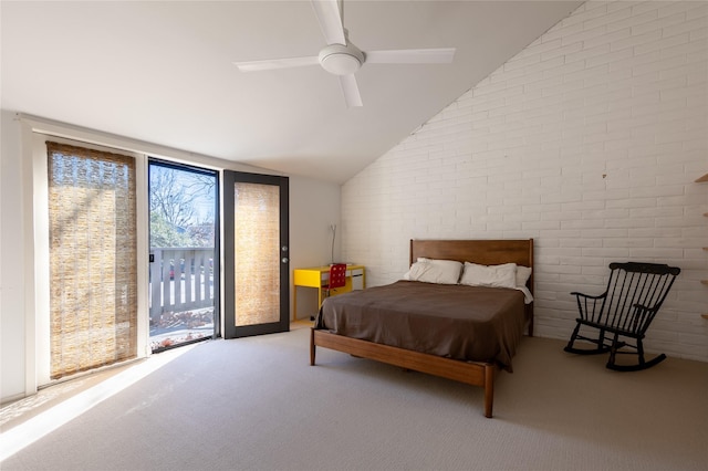 bedroom featuring vaulted ceiling, carpet floors, a ceiling fan, and access to exterior