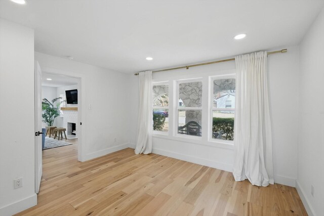 living room with stairs, recessed lighting, visible vents, and light wood finished floors