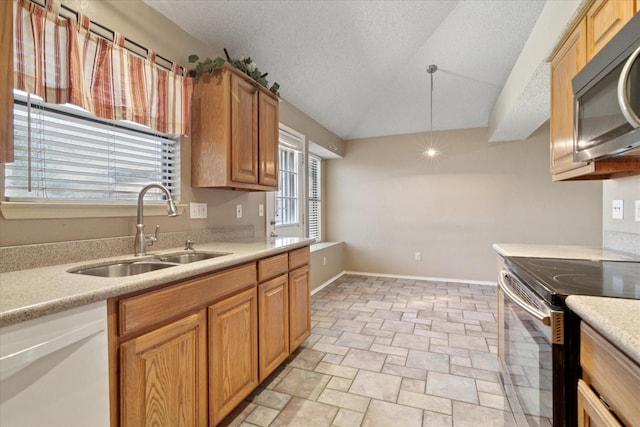 kitchen featuring a sink, baseboards, light countertops, stainless steel electric range, and dishwasher