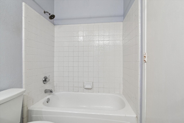 full bath featuring shower / bathing tub combination and toilet