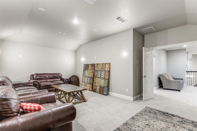 living area featuring visible vents, vaulted ceiling, and light colored carpet