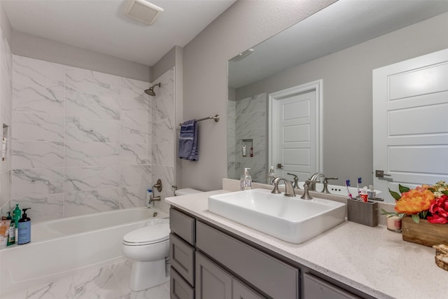 full bathroom featuring shower / washtub combination, marble finish floor, visible vents, toilet, and vanity