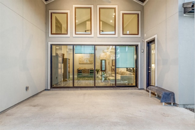 doorway to property with stucco siding