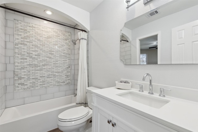 full bathroom featuring toilet, visible vents, shower / bathtub combination with curtain, and vanity
