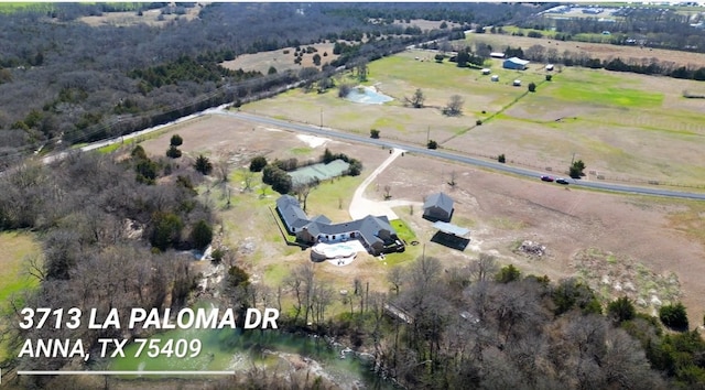 bird's eye view with a rural view