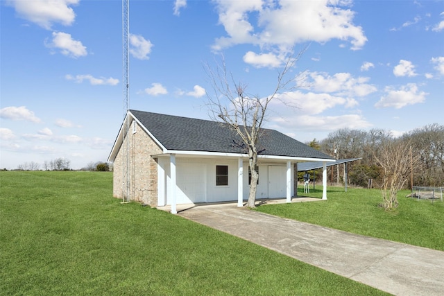 view of front of property with a shingled roof, a front lawn, stone siding, a garage, and concrete driveway