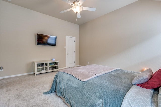 bedroom featuring baseboards, a ceiling fan, and carpet flooring