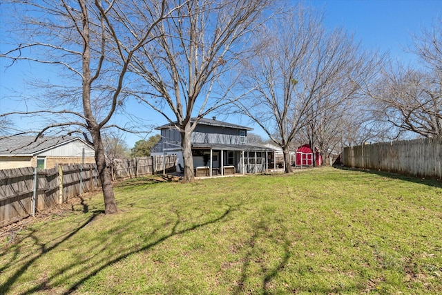 view of yard featuring a fenced backyard