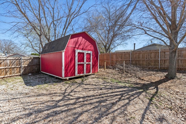 view of shed featuring a fenced backyard