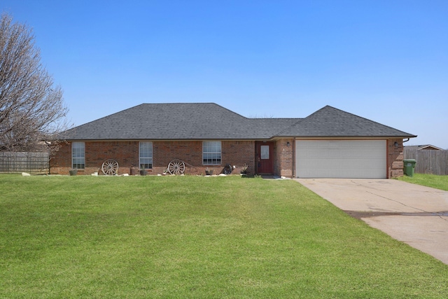 ranch-style home with brick siding, concrete driveway, fence, a garage, and a front lawn