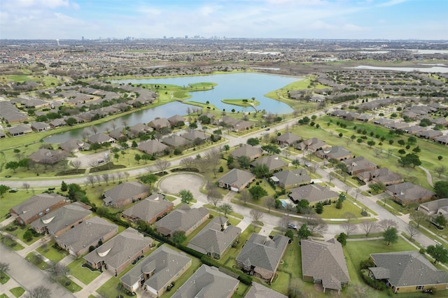 aerial view featuring a water view and a residential view