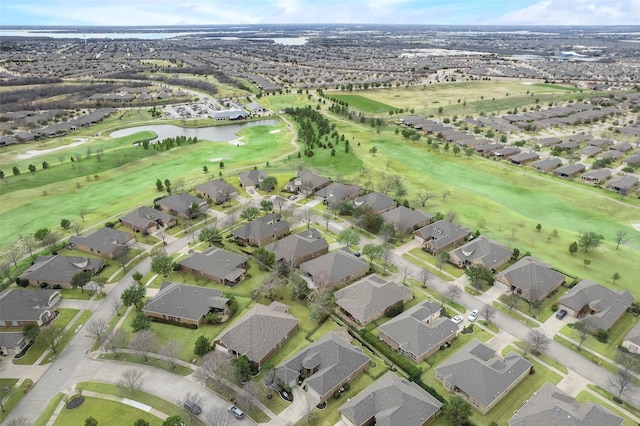 birds eye view of property featuring a residential view and a water view