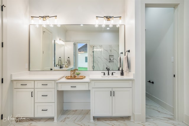 full bath with marble finish floor, a marble finish shower, vanity, and baseboards