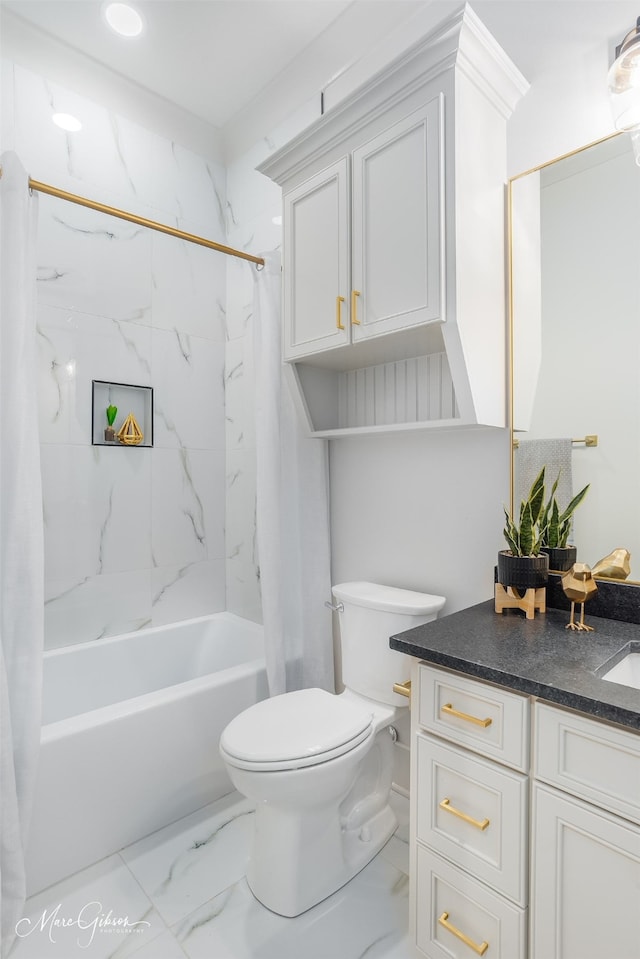 full bathroom with toilet, marble finish floor, shower / bath combo, and vanity