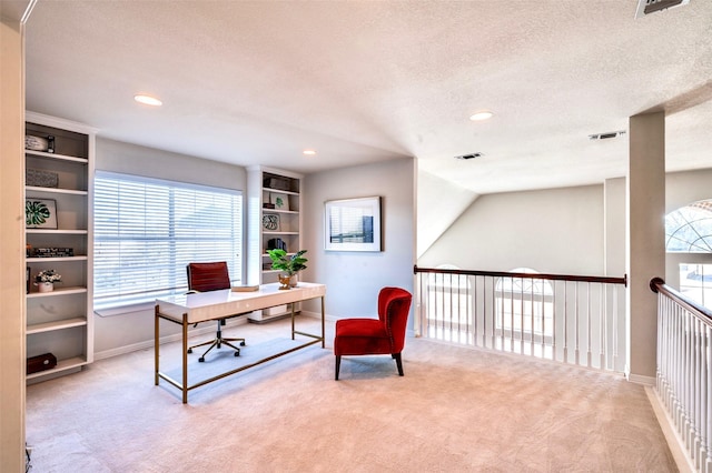 office space featuring carpet flooring, recessed lighting, baseboards, and a textured ceiling