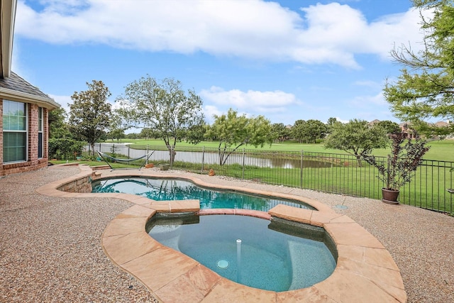 view of pool with an in ground hot tub, a water view, a fenced backyard, and a fenced in pool