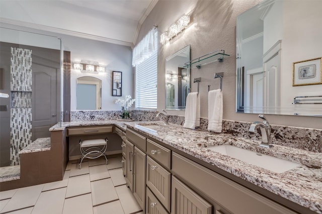 full bath with a sink, walk in shower, crown molding, and double vanity