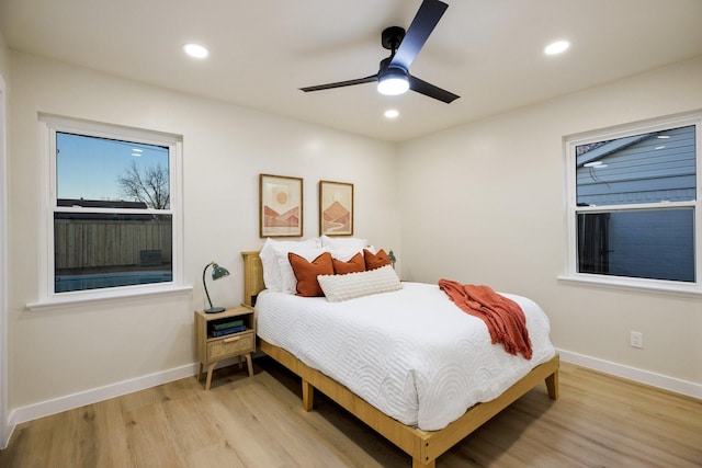 bedroom with recessed lighting, baseboards, ceiling fan, and light wood finished floors