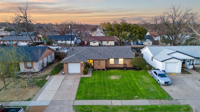 aerial view at dusk with a residential view