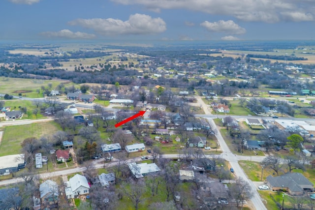 birds eye view of property with a residential view