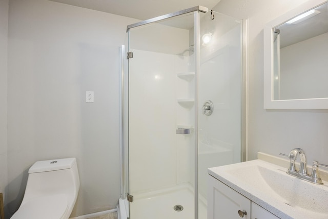 full bath featuring a shower stall, toilet, and vanity