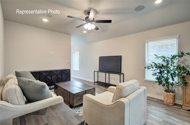 living room with recessed lighting, ceiling fan, baseboards, and wood finished floors