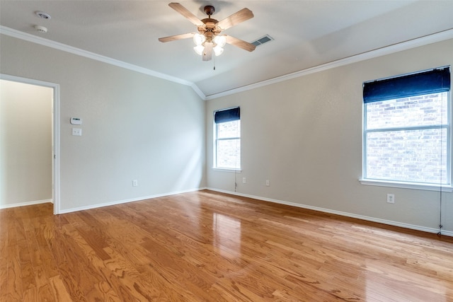 unfurnished room featuring crown molding, ceiling fan, and light wood-style floors